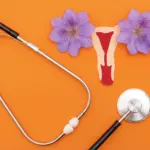 Illustration of the female uterus with menstrual flow next to a stethoscope on an orange background, symbolizing gynecological health.